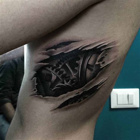 rib to thigh tattoo